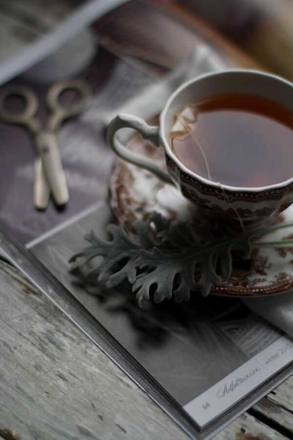 A warm drink on a table in soft light, suggesting a quiet moment